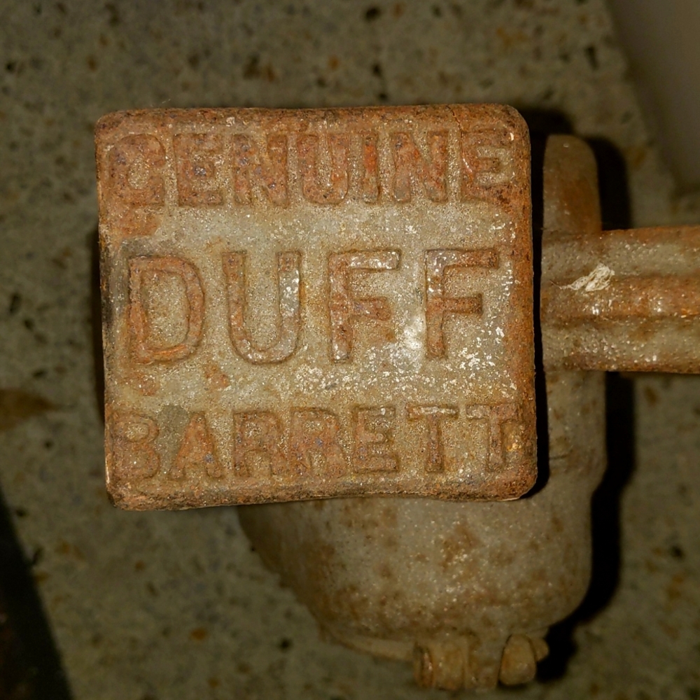 An antique duff Barrett railroad jack #516